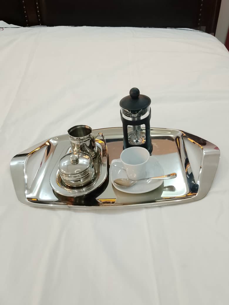 Breakfast in Bed Bundle featuring a stainless steel tray, tea cup, milk cup/sugar bowl, tea spoon, and coffee plunger for a cozy Valentine’s morning.