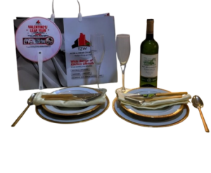 Romantic Dinner Bundle featuring 2 champagne flute glasses, 1 CH ROUSSEAU Bordeaux white wine, 2 spoons, 2 forks, 2 knives, 2 plates, and 2 side plates for an elegant Valentine’s celebration.